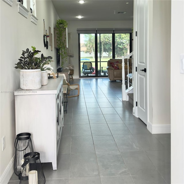 8123 NW 78th St, Tamarac, FL 33321 - hall featuring baseboards and tile patterned flooring
