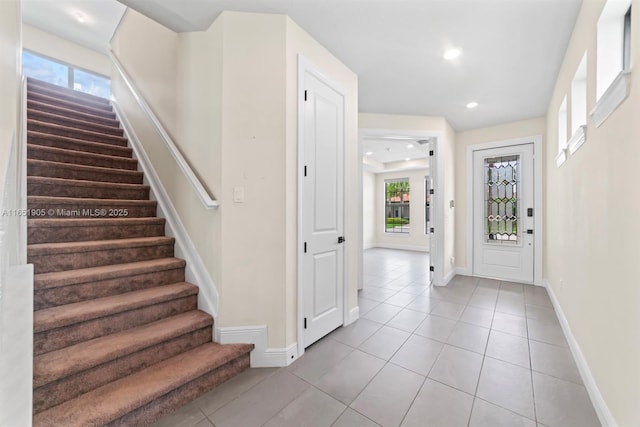 8123 NW 78th St, Tamarac, FL 33321 - foyer featuring stairs, light tile patterned floors, and recessed lighting