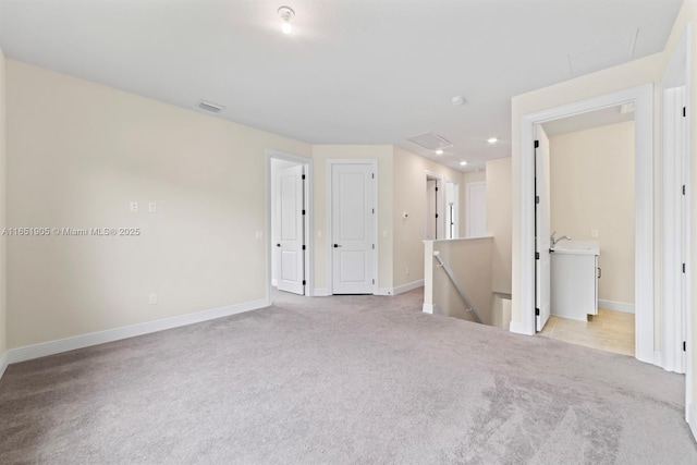 8123 NW 78th St, Tamarac, FL 33321 - spare room featuring light carpet, recessed lighting, and attic access