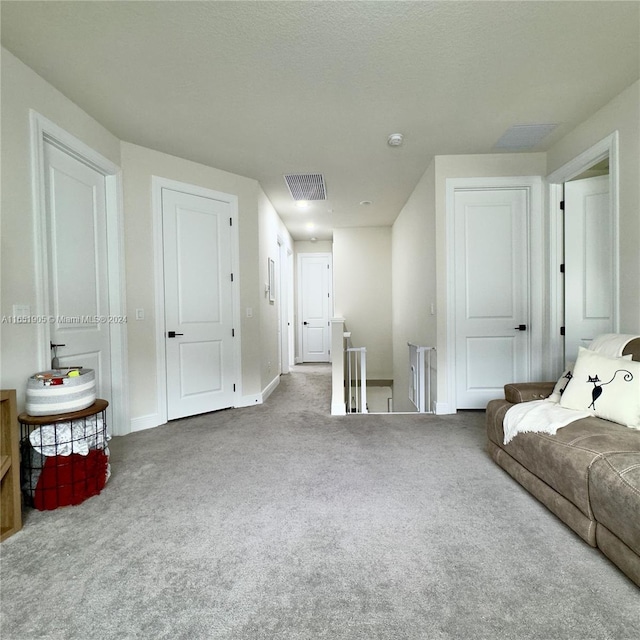 8123 NW 78th St, Tamarac, FL 33321 - living area featuring carpet and baseboards