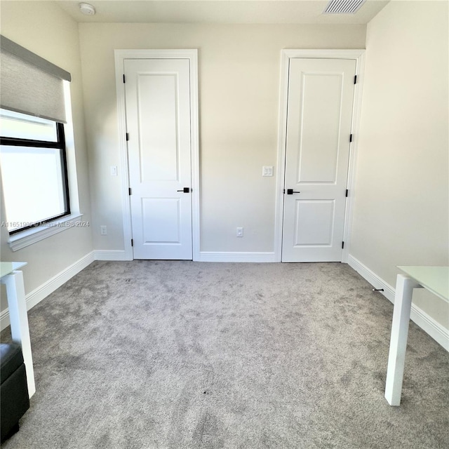 8123 NW 78th St, Tamarac, FL 33321 - unfurnished bedroom featuring carpet floors and baseboards