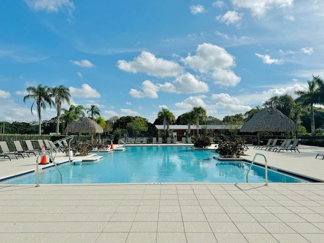 8123 NW 78th St, Tamarac, FL 33321 - community pool featuring a patio area and a gazebo