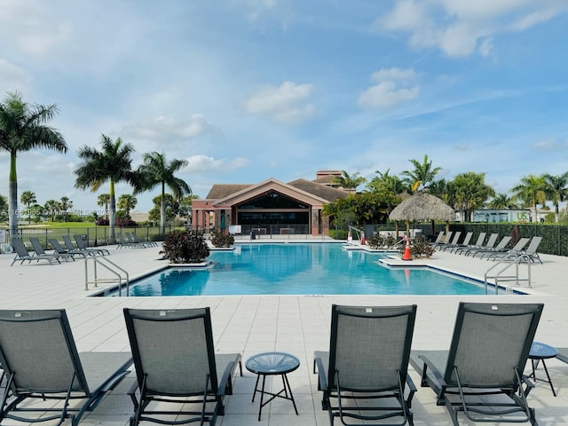 8123 NW 78th St, Tamarac, FL 33321 - community pool with a patio area