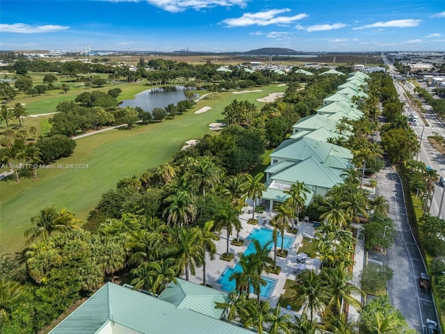aerial view featuring a water view and view of golf course