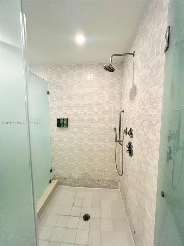 bathroom with a shower stall