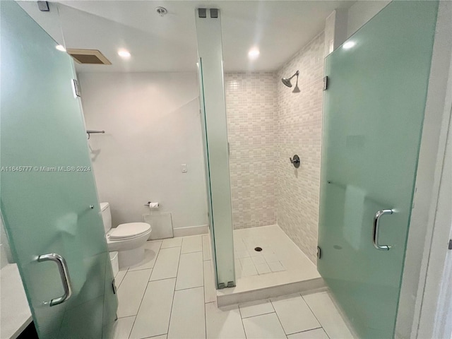 full bath featuring tile patterned flooring and a stall shower