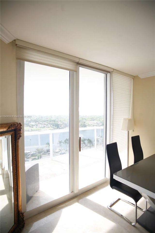 office featuring a water view and expansive windows