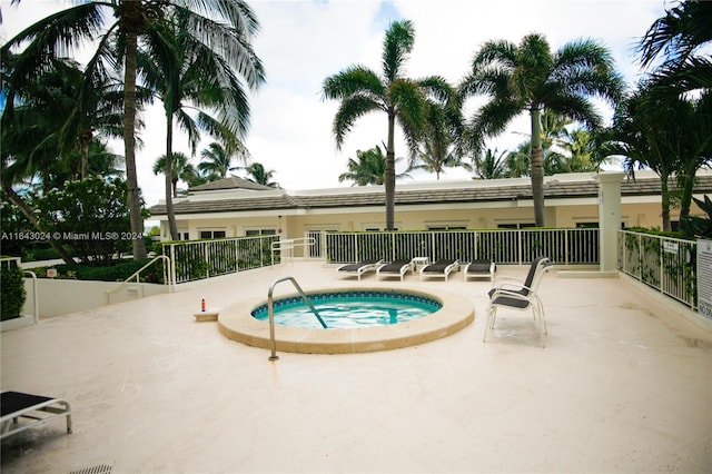 view of pool featuring a community hot tub