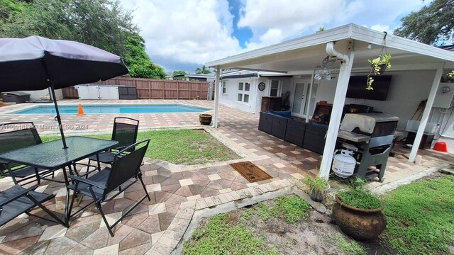 exterior space with a shed and a patio