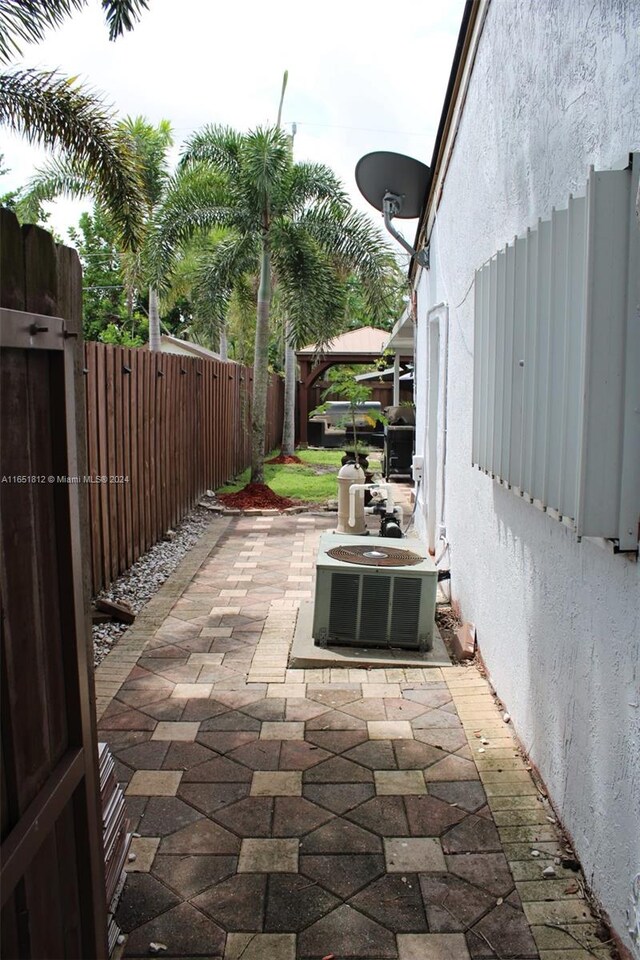 view of patio / terrace featuring cooling unit