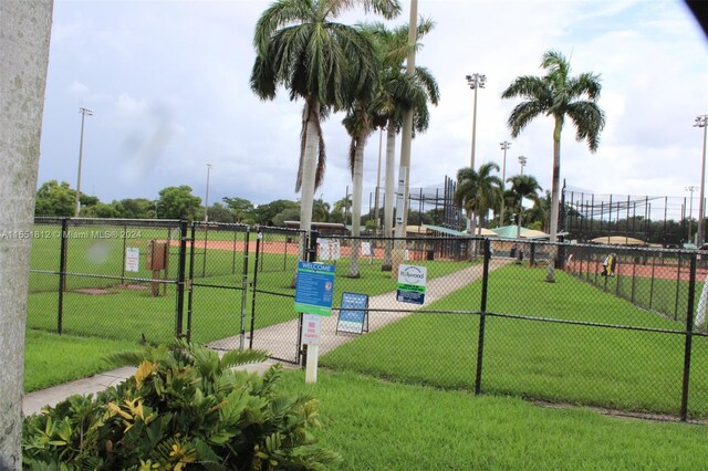 view of home's community featuring a lawn