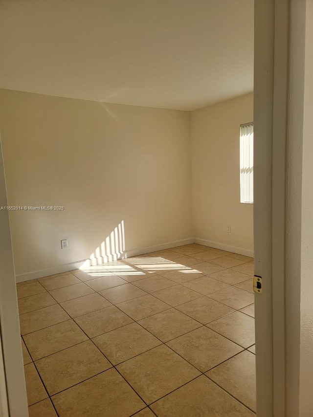 view of tiled spare room