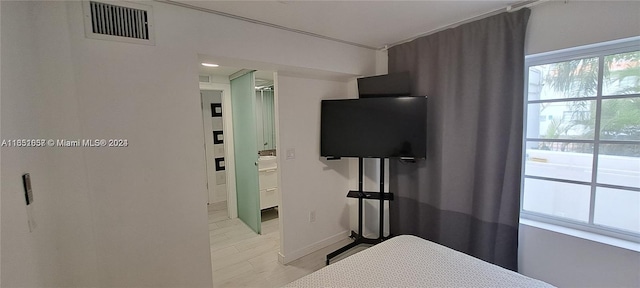 846 Michigan Ave Unit 101, Miami Beach, FL 33139 - bedroom featuring baseboards