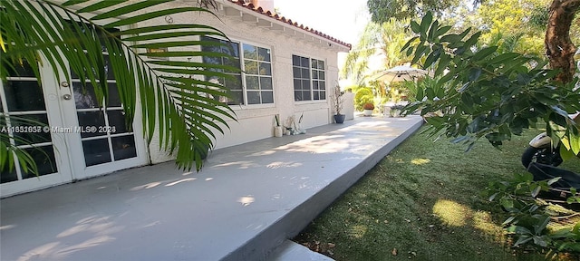 846 Michigan Ave Unit 101, Miami Beach, FL 33139 - view of patio featuring french doors