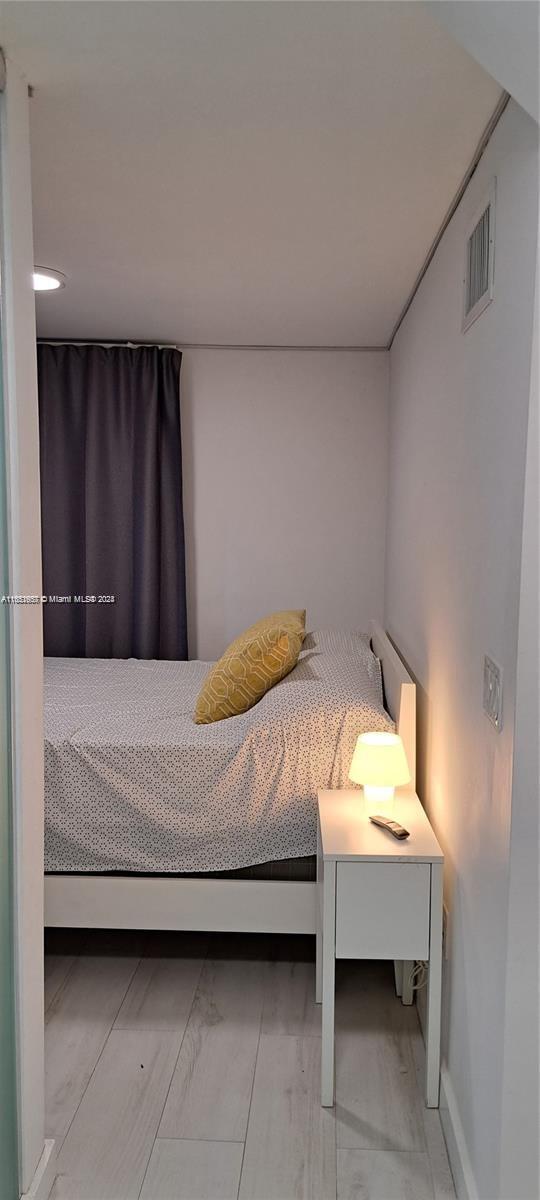 846 Michigan Ave Unit 101, Miami Beach, FL 33139 - bedroom featuring baseboards