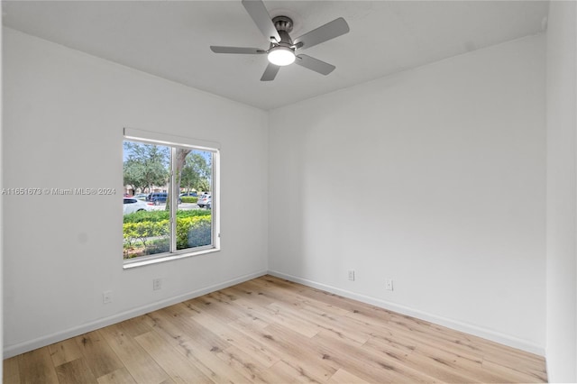 unfurnished room with light hardwood / wood-style flooring and ceiling fan