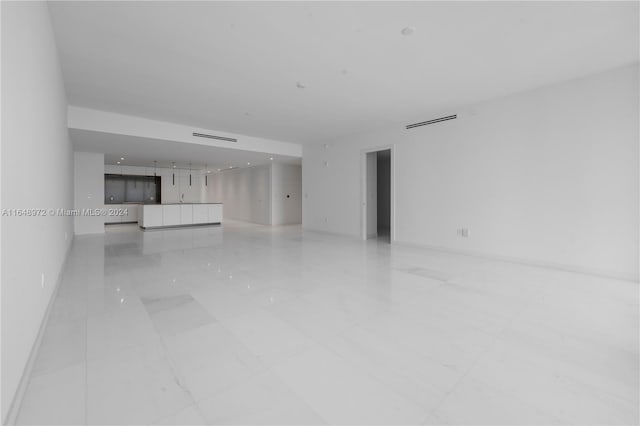 300 Biscayne Blvd Way Unit 4404, Miami, FL 33131 - unfurnished living room featuring baseboards