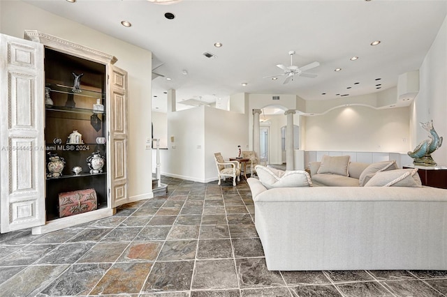 living room with ceiling fan