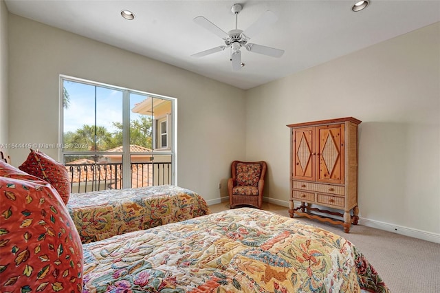 carpeted bedroom with access to outside and ceiling fan