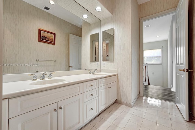 bathroom with vanity and tile patterned floors