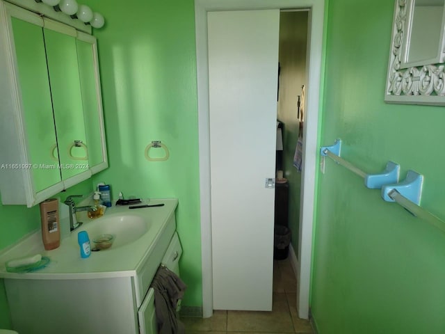 bathroom with vanity and tile patterned floors