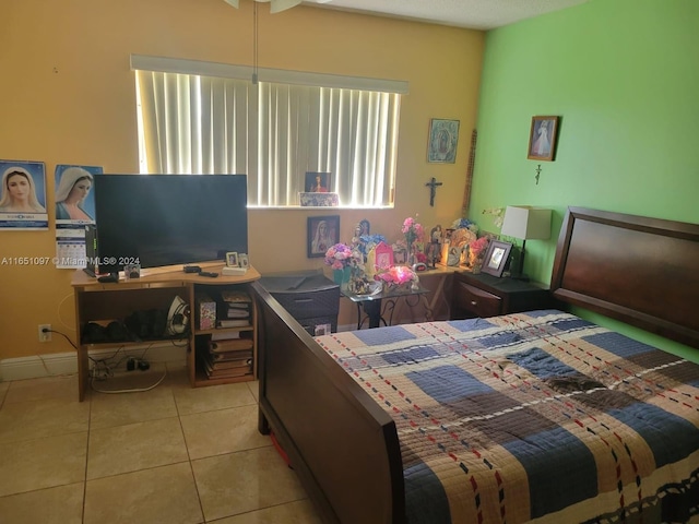 bedroom featuring light tile patterned flooring