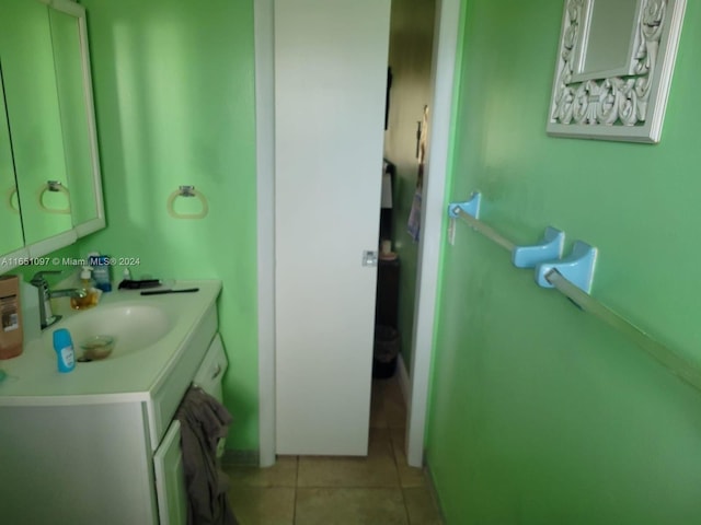 bathroom with vanity and tile patterned floors