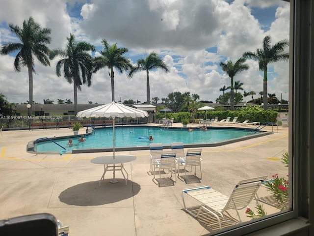 view of swimming pool featuring a patio