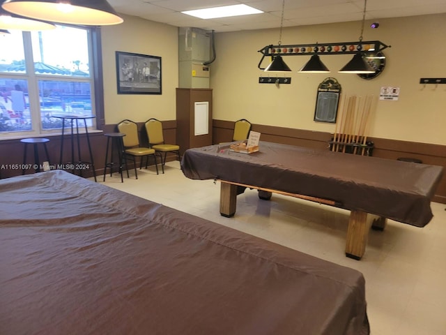 game room featuring pool table and a drop ceiling