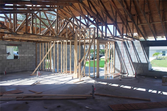 misc room with lofted ceiling