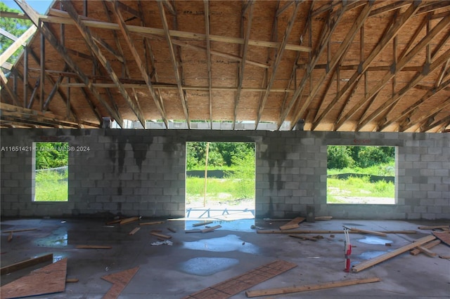 misc room with lofted ceiling