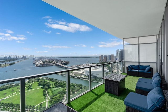 1100 Biscayne Blvd Unit 4004, Miami, FL 33132 - balcony featuring a city view, a water view, and an outdoor living space