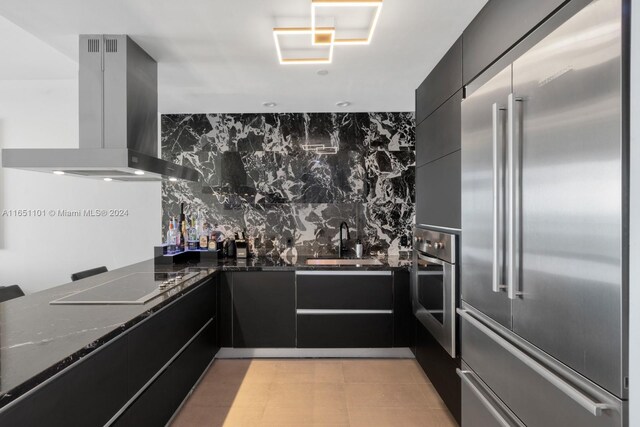 1100 Biscayne Blvd Unit 4004, Miami, FL 33132 - kitchen featuring appliances with stainless steel finishes, a sink, dark cabinets, island range hood, and modern cabinets