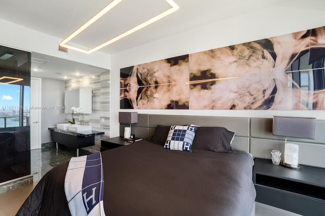 bedroom featuring tile walls