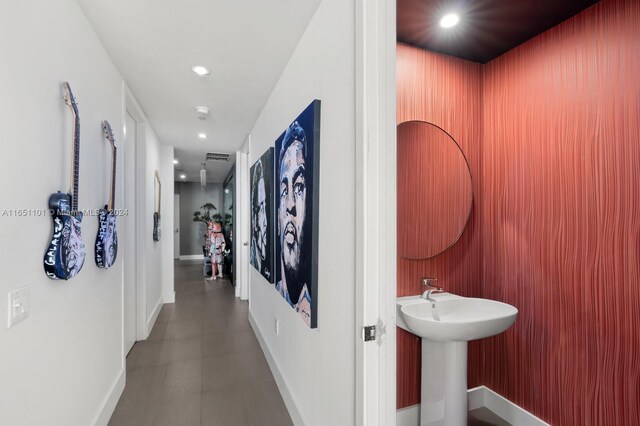 1100 Biscayne Blvd Unit 4004, Miami, FL 33132 - hallway featuring a sink, baseboards, and recessed lighting