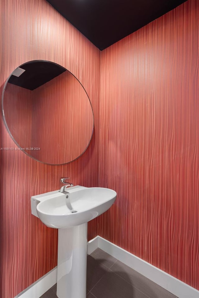 bathroom featuring tile patterned flooring