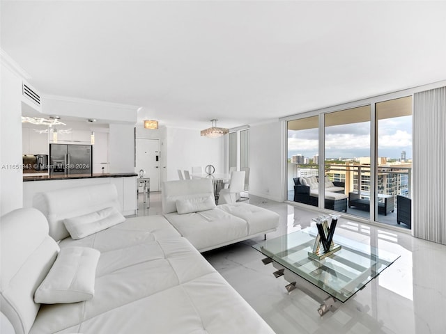 living room with crown molding and floor to ceiling windows