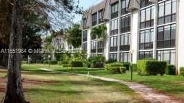 view of home's community featuring a lawn