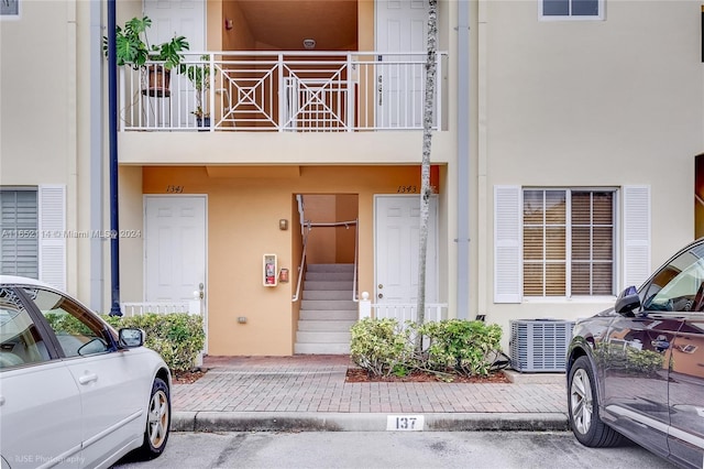 doorway to property with a balcony