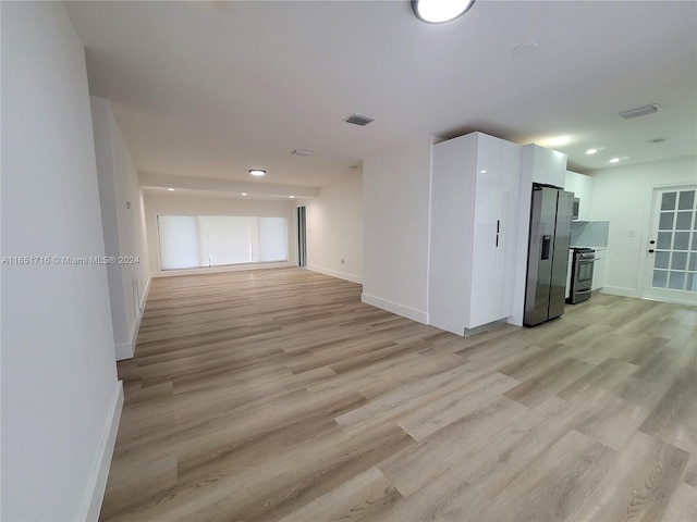 empty room with light wood-type flooring