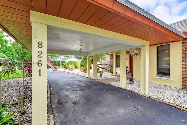 view of patio featuring a carport