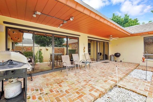 view of patio with ceiling fan