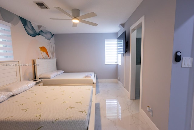 bedroom featuring ceiling fan