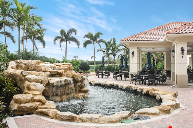 surrounding community with a patio