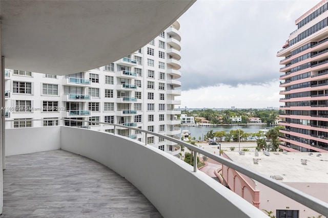 balcony featuring a water view