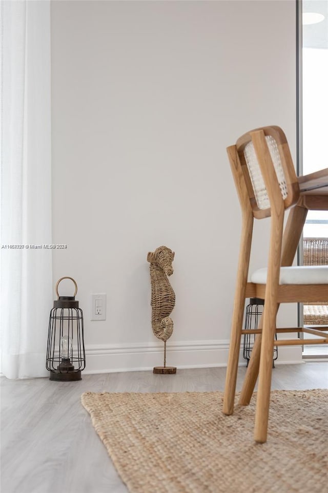 interior space featuring baseboards