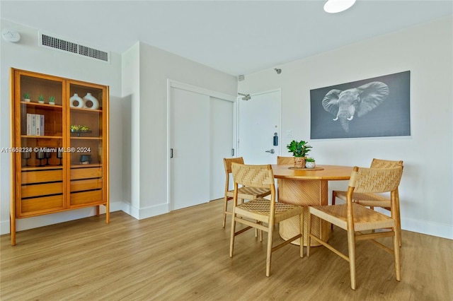 dining room featuring light hardwood / wood-style floors