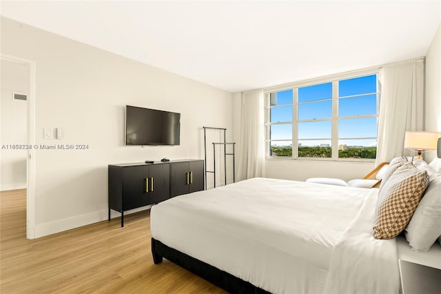 bedroom featuring light wood-type flooring