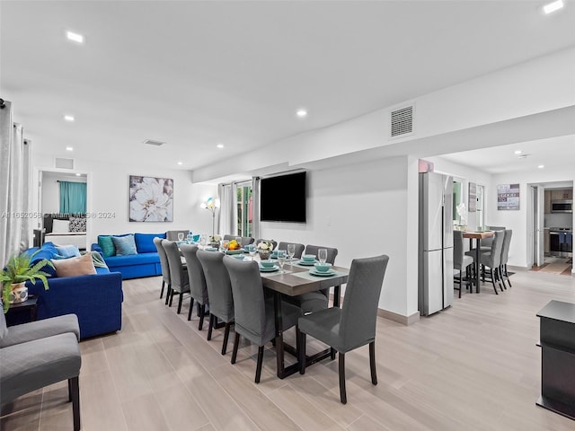 2320 SW 36th Ave, Fort Lauderdale, FL 33312 - dining area with light wood-style floors, recessed lighting, and visible vents