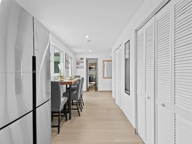 hallway featuring light hardwood / wood-style floors